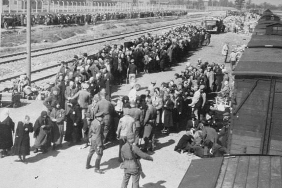 Jews from Subcarpathian Rus undergo a selection on the ramp at Auschwitz-Birkenau